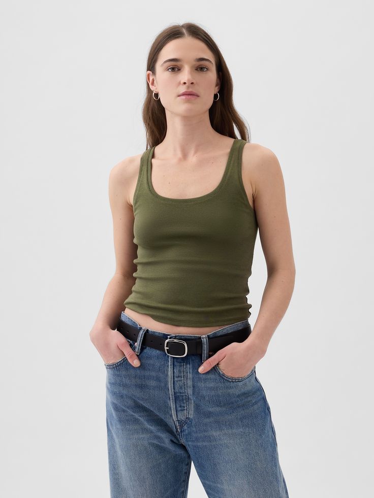 Supersoft cotton-modal blend cropped tank top.  Scoop neck.  Tank straps.  * Fit: Stretch-to-Fit.  Slim & stretchy that forms to your shape.  Cropped, hits at the waist.  Models wearing Gap Tank Top Layering Outfit, Green Top Outfit, Tank Top Layering, Olive Tank Top, Crop Top Aesthetic, Tank Outfit, Tank Top Outfits, Green Tank Top, Layering Outfits