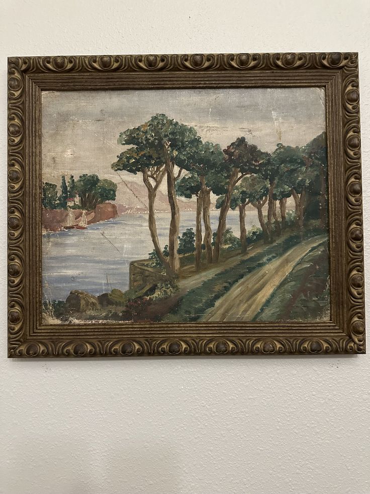 a painting hanging on the side of a wall