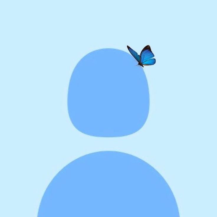 a blue butterfly flying in the sky