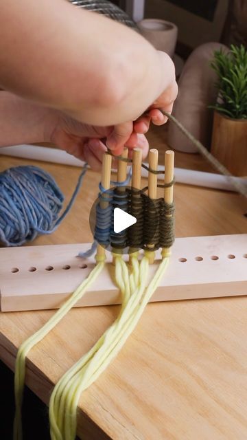 a video demonstrating how to use the loom for knitting with yarn and cotton balls