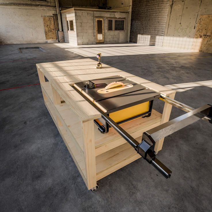 a workbench made out of wood with tools attached to the top and bottom