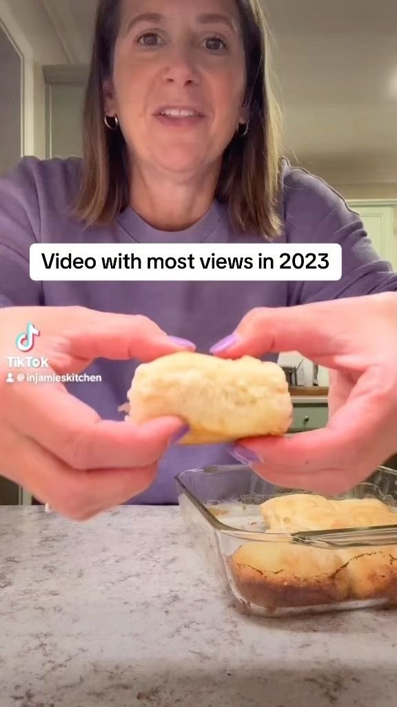 a woman holding food in her hands with the caption video with most views in 2013