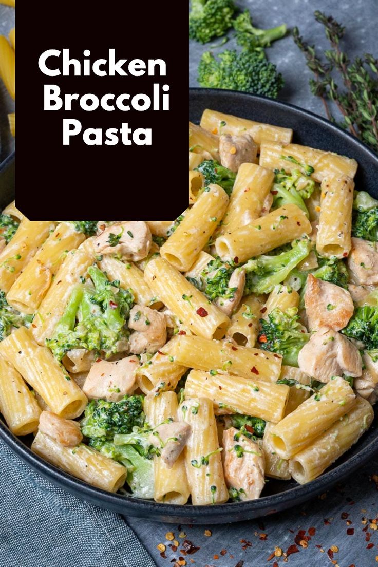 chicken broccoli pasta in a black bowl