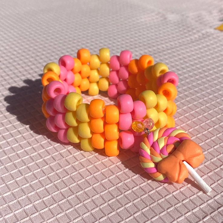 an assortment of candy beads on a table