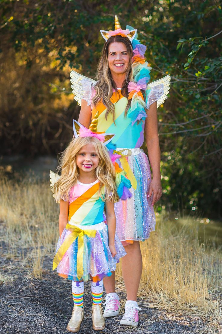 a mother and daughter dressed up as unicorns