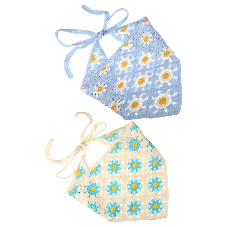 three pieces of cloth with blue and yellow flowers on them