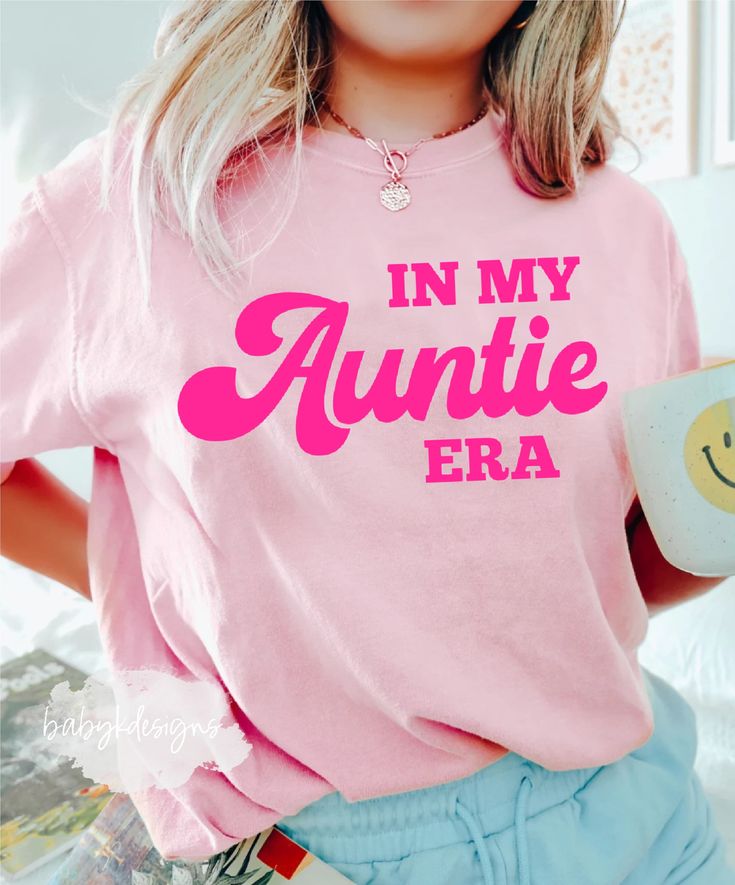 "IIn My Auntie Era Shirt, Aunt Era Shirt, Eras Shirt, Oversized Aunt Shirt, Retro Aunt Shirt, Comfort Color® Shirt, Baby Announcement for Aunt Perfect gift for a special Sister in your life.  Perfect for new Auntie♥ 📋 HOW TO ORDER: 1. Select the size 2. Select the color 3. Select the quantity  4. Add personalization if required 5.Add to Cart (\"buy now\" will take you directly to checkout and \"add to cart\" will allow you to continue shopping with us) 6. Submit order (Shipping will automatical Best Auntie Shirt, Cool Aunt Club Shirt, Auntie And Me Shirts, Aunt Era Shirt, I’m My Auntie Era, Aunt Life Shirt, Auntie Shirts For Nieces, Cute Tee Shirt Designs, New Aunt Shirts