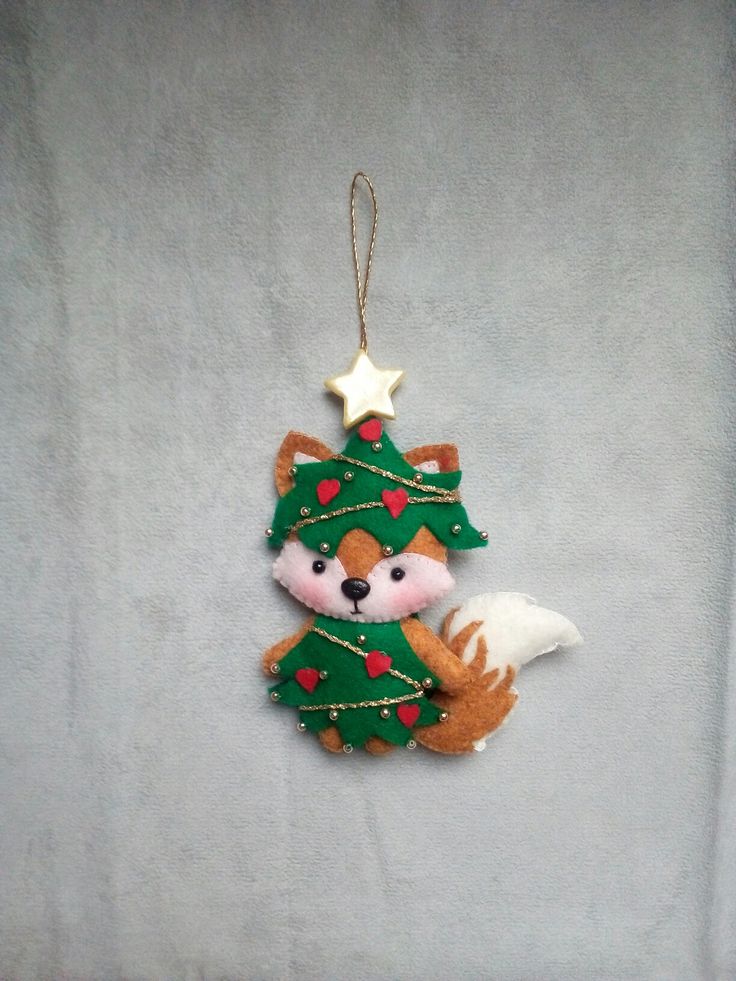 a christmas ornament hanging on a towel