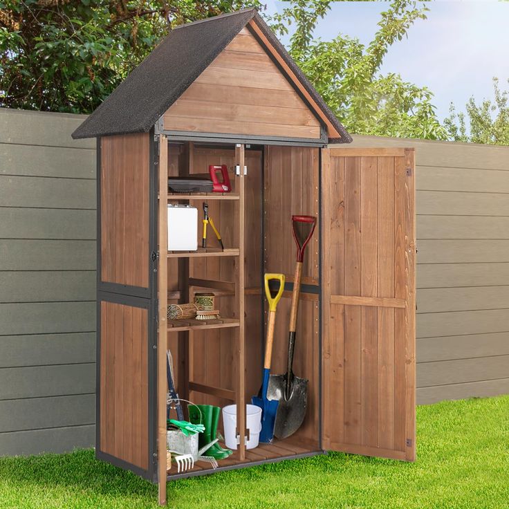 an outdoor storage shed with gardening tools and cleaning supplies in the door open on green grass