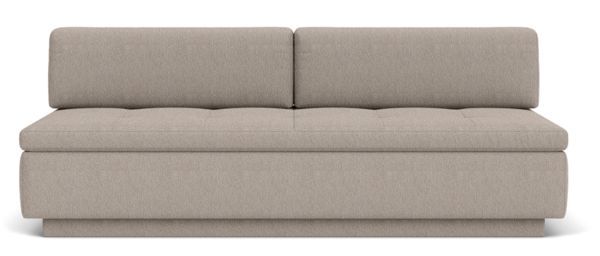 a beige couch sitting on top of a white floor