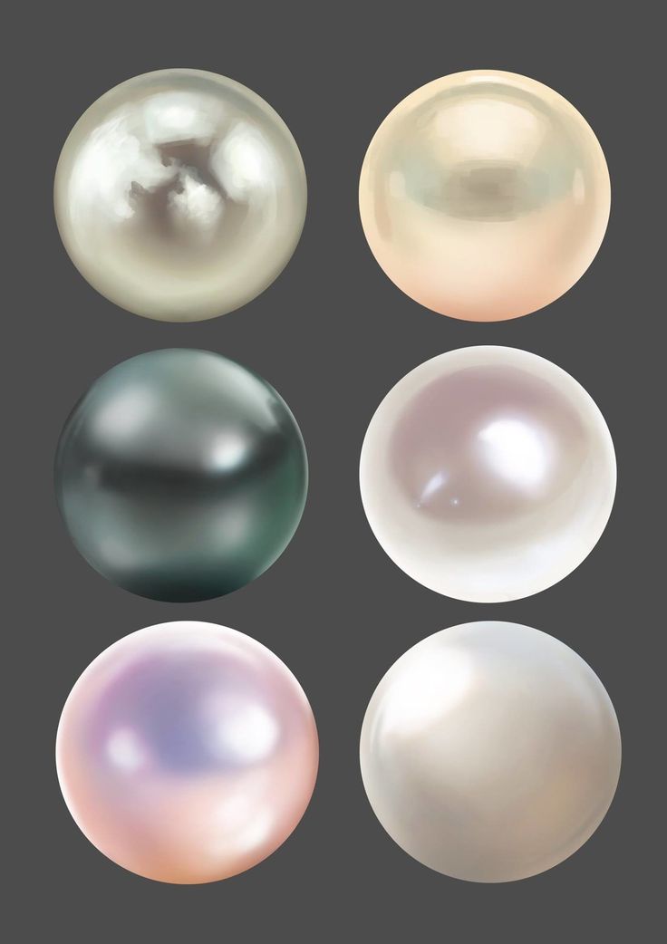 four different colored pearls on a black background