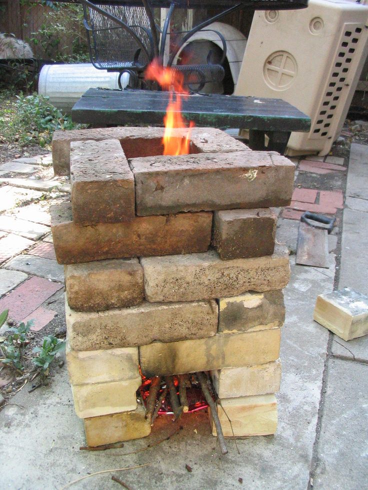 an outdoor fire pit with the words 6 different ways to build a rocket stove