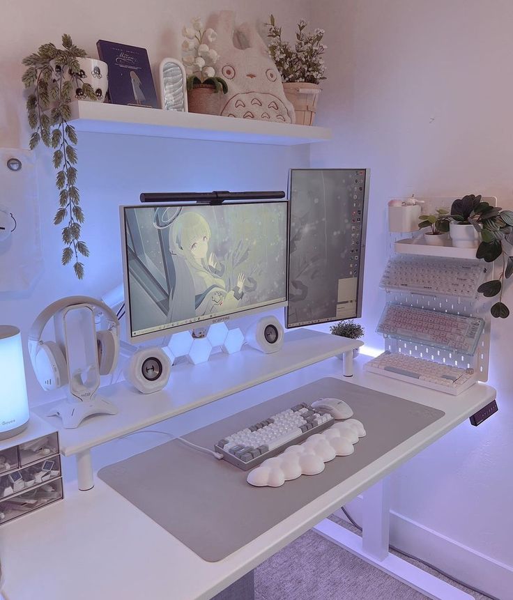 a computer desk with two monitors on it