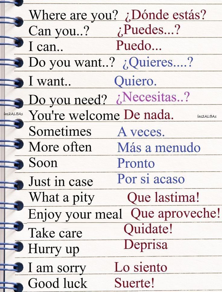 an open notebook with spanish words written in different languages on the pages, which are lined up