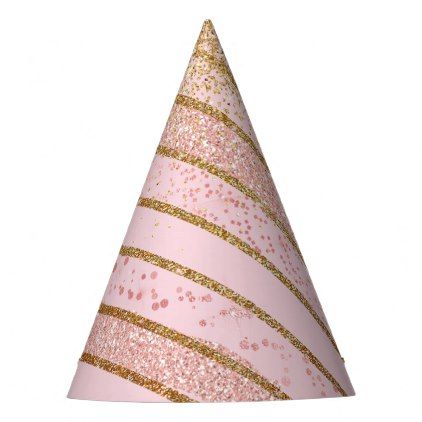 a pink party hat with gold glitter stripes