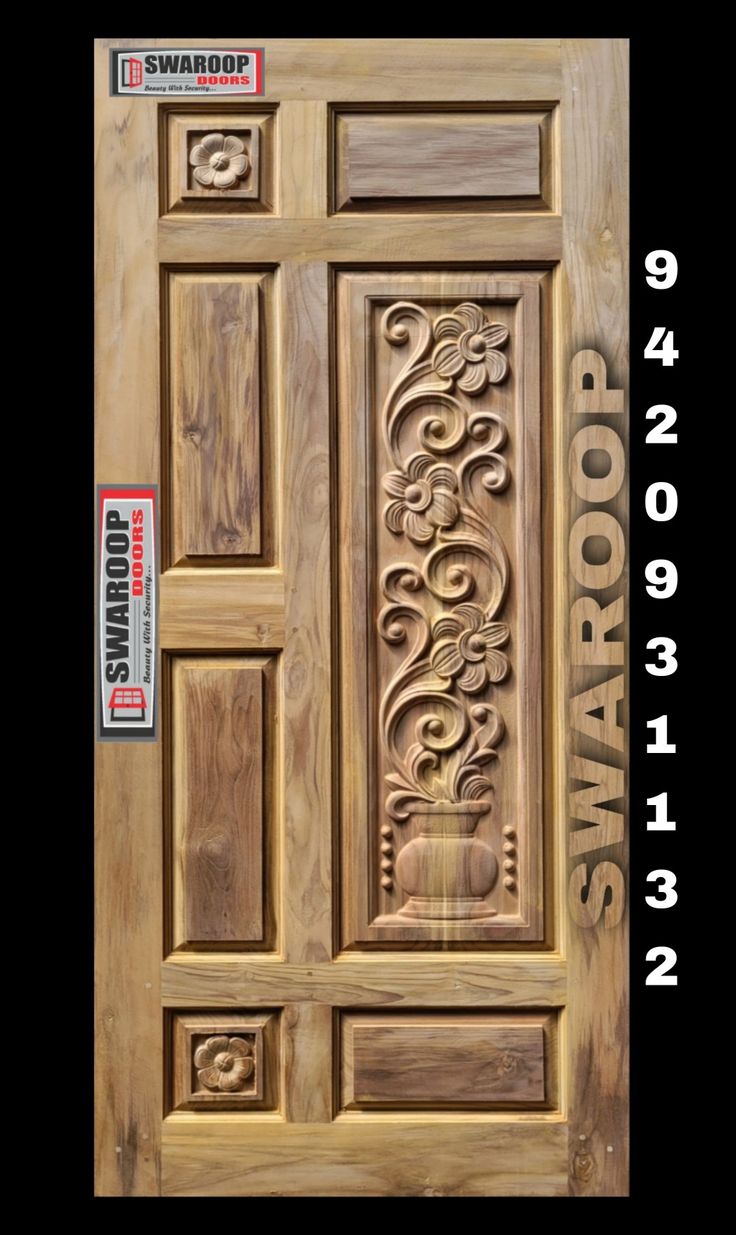 the front door is made from wood and has carvings on it