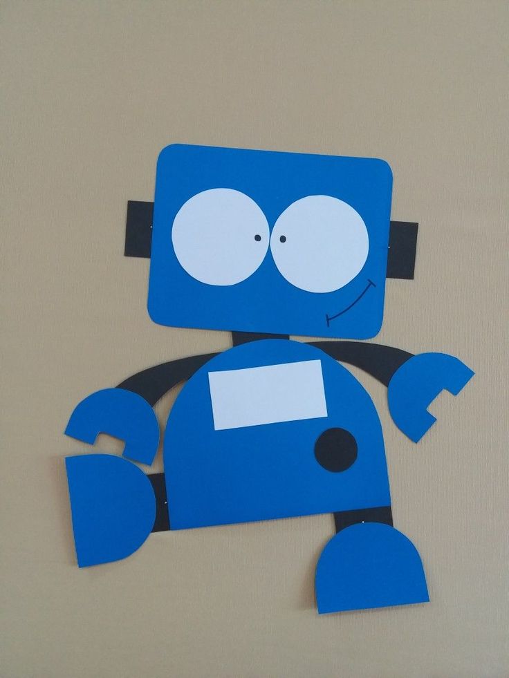 a paper cut out of a blue robot