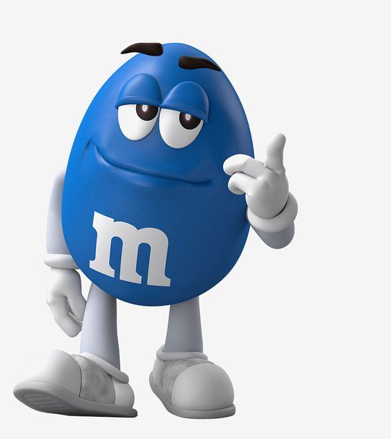 a blue m & m's character is pointing at the camera