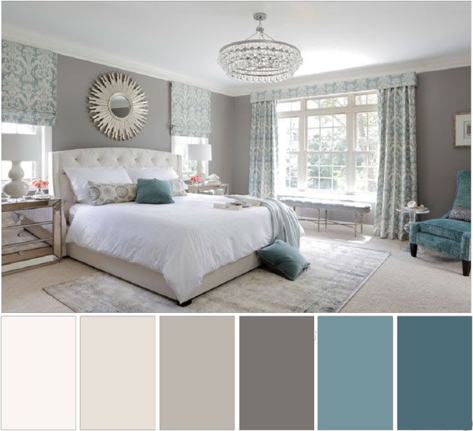 a bedroom with gray walls, white bedding and blue accents in shades of grey