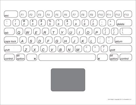 an image of a computer keyboard with the key board and mouse pad highlighted in black and white