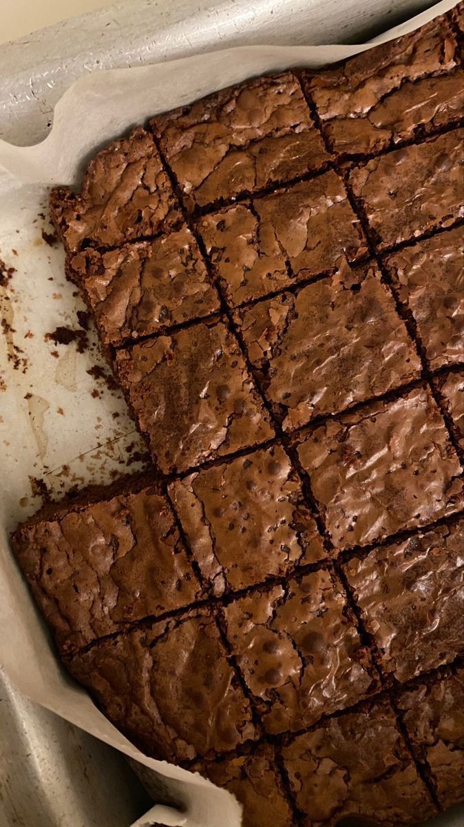 chocolate brownies in a baking pan ready to be baked