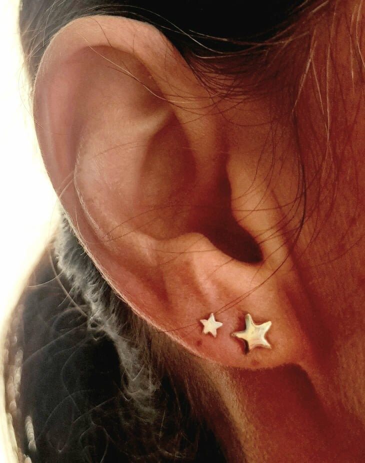 Star Earrings, Small star silver Earrings, Cute Silver Studs, Sterling Silver Studs, Minimalist earrings, Simple Earrings. Our dainty minimalist earring, features a 6mm sterling silver star with silver butterflies. The star is solid and not flat, slightly domed. Details:  - Hand made 925 sterling silver. Also available in gold vermeil.   - Sent in a cute tin box.  Currently I send my orders from Portugal, Europe. Germany - Verpackungsgesetz (LUCID Packaging Register) Star Stud Earrings, Dainty Silver Star Cartilage Earrings, Silver Dainty Earrings With Star Charm, Minimalist Silver Star Cartilage Earrings, Dainty Star Silver Earrings, Silver Dainty Star Charm Earrings, Sterling Silver Star Cartilage Earrings With Star Charm, Sterling Silver Star Charm Cartilage Earrings, Tiny Silver Star Cartilage Earrings