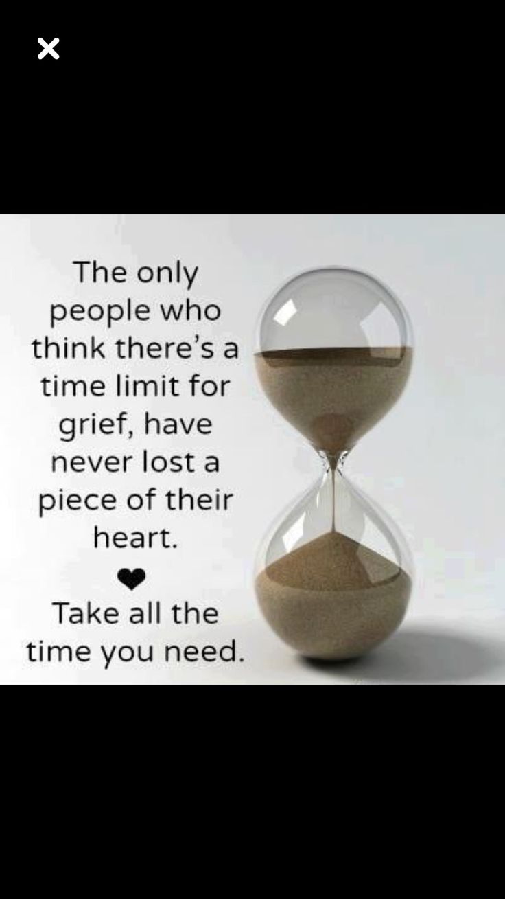 an hourglass sitting on top of a table next to a quote that reads, the only people who think there's a time limit for grie