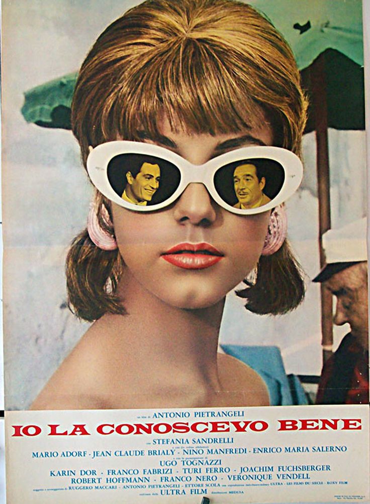 an old movie poster with the image of a woman's face and two men in sunglasses