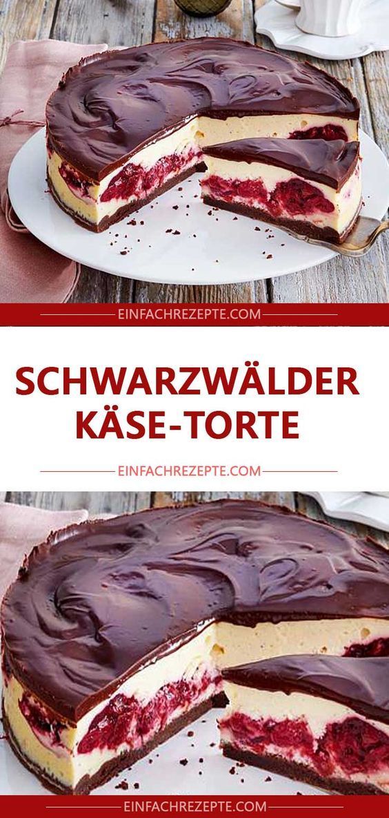 a cheesecake with chocolate and raspberry filling is cut in half on a white plate