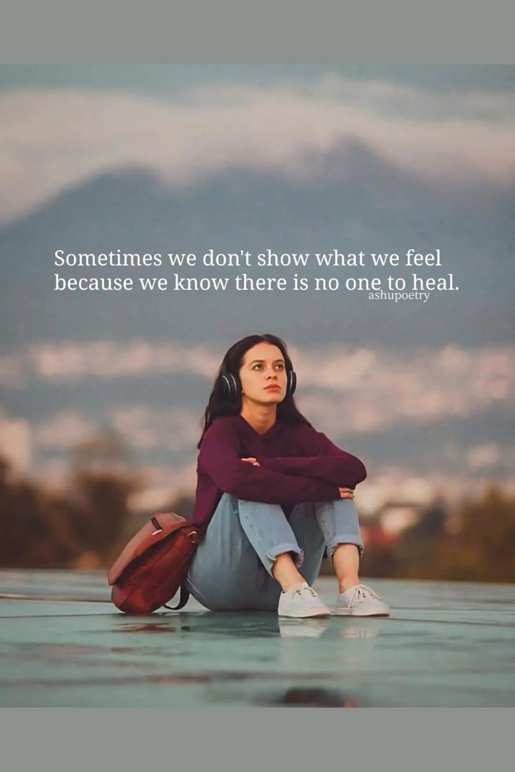 a woman sitting on the ground with headphones in her ears and a quote above her