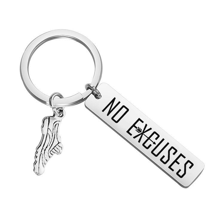 a metal keychain with the words no exudess on it