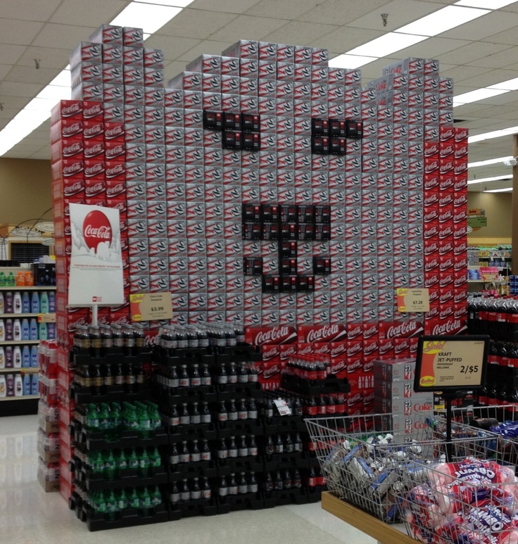 the soda cans are stacked on top of each other to look like a dog head