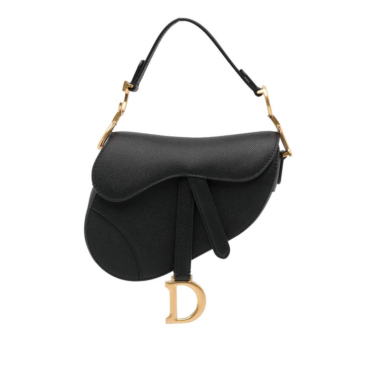 Dior's Saddle Bag is one of the house's most popular bags with its different variations and unusual shape. This mini-sized model is made of black calfskin and shines with gold-tone details. On the front flap is a gold-tone D monogram-Tag which shows the affiliation to the French traditional house Dior. With its flat leather shoulder strap, the Bag best carried in the hand or on the arm. Dior Saddle, Maria Grazia Chiuri, Popular Bags, Christian Dior Couture, Maria Grazia, Dior Couture, John Galliano, Saddle Bag, Women Leather