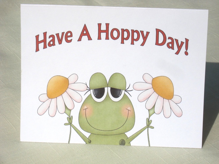 a card with a frog holding two daisies on it's head and the words have a happy day