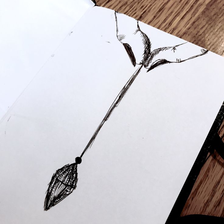 a piece of paper with a drawing of a flower on it