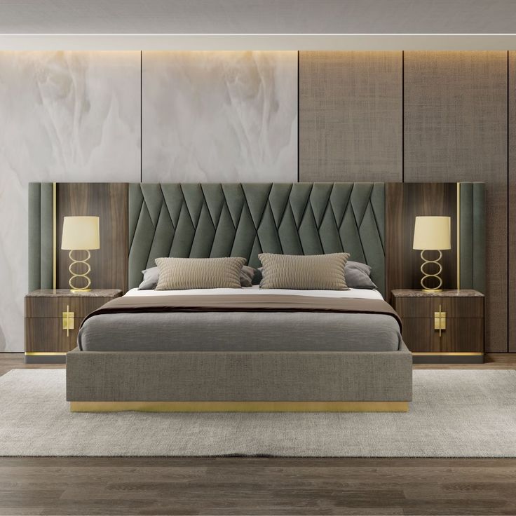 a bedroom with a bed, nightstands and two lamps on either side of the bed