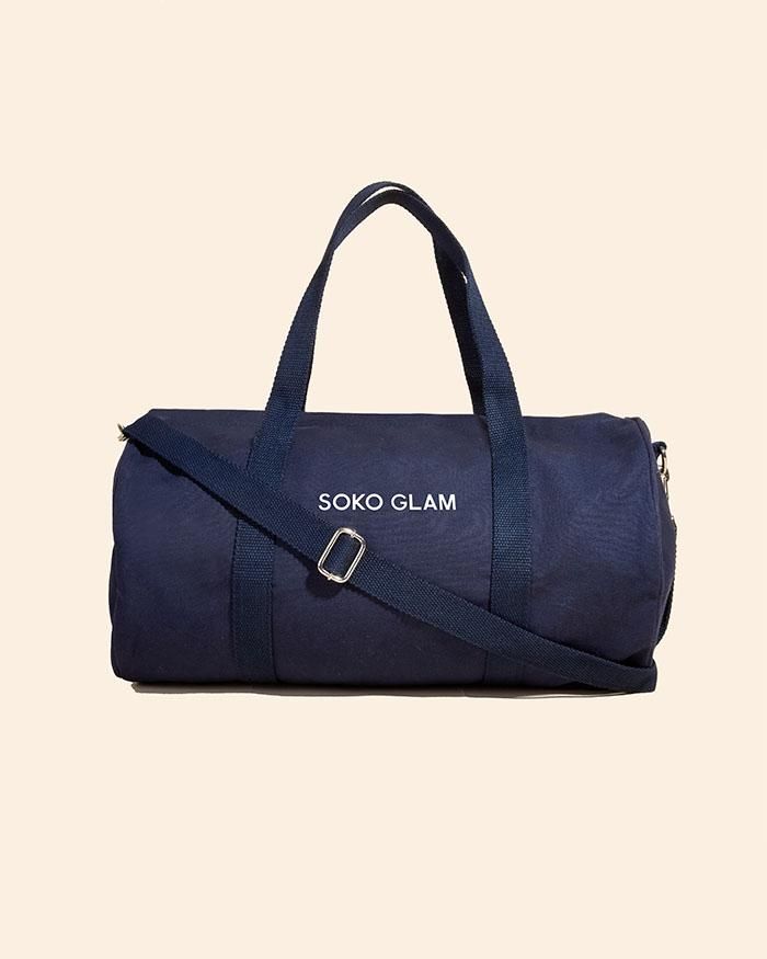 Soko Glam Canvas Weekender SWAG SOKO GLAM Sporty Canvas Gym Bag, Casual Large Capacity Duffle Bag For Weekend, Casual Gym Bag With Luggage Sleeve, Sporty Canvas Gym Bag For Travel, Casual Navy Duffle Bag For Travel, Casual Navy Travel Bag For Everyday Use, Navy Casual Everyday Travel Bag, Casual Navy Everyday Duffle Bag, Sporty Weekend Duffle Bag