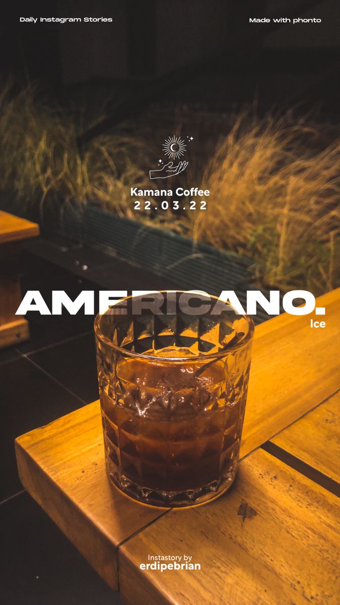 an americano drink sitting on top of a wooden table