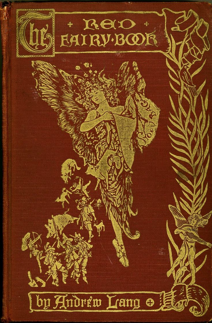 an old red book with gold lettering and illustrations on the front cover, in yellow ink