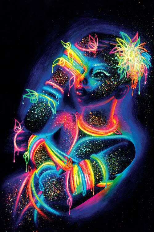 a woman with neon paint on her body