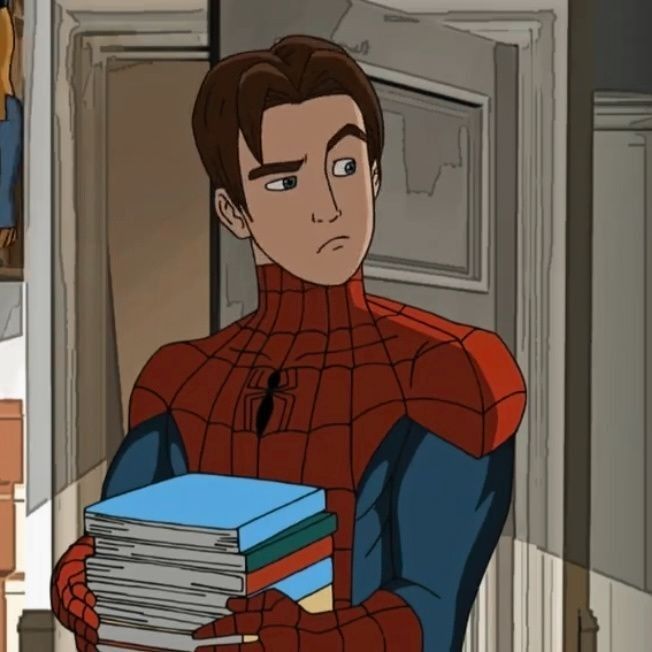 the spider - man is holding a stack of books in his hands