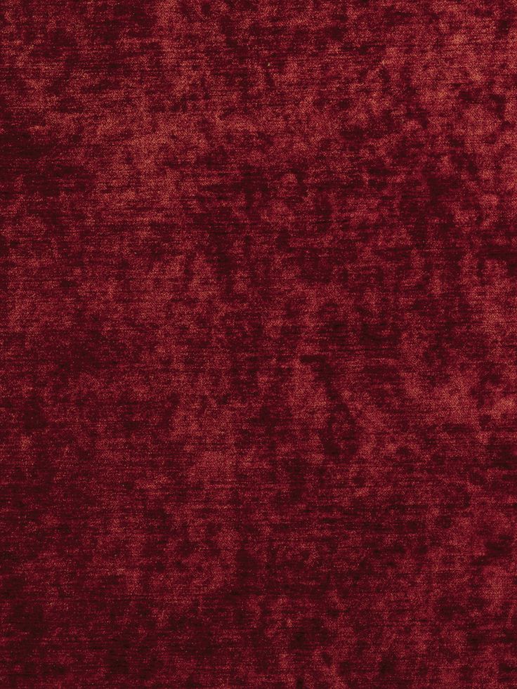 a red velvet textured background that looks like it could be used as a wallpaper