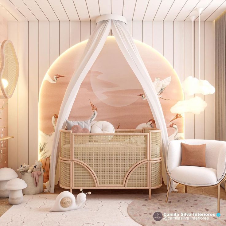 a baby's room with a canopy bed and two chairs in front of it