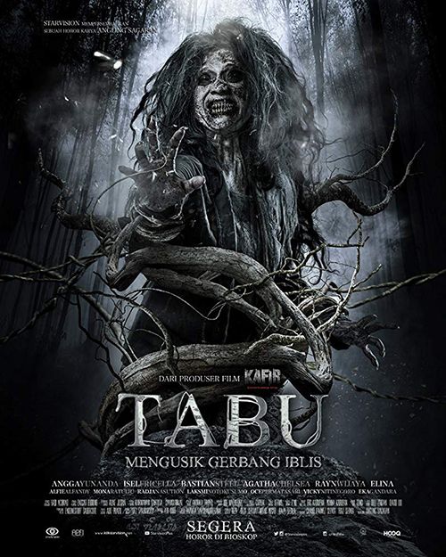 the movie poster for tabu, featuring a woman with long hair and an evil face