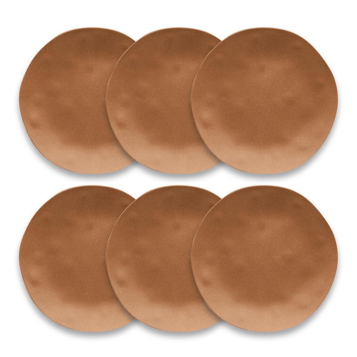 six brown round coasters on a white background