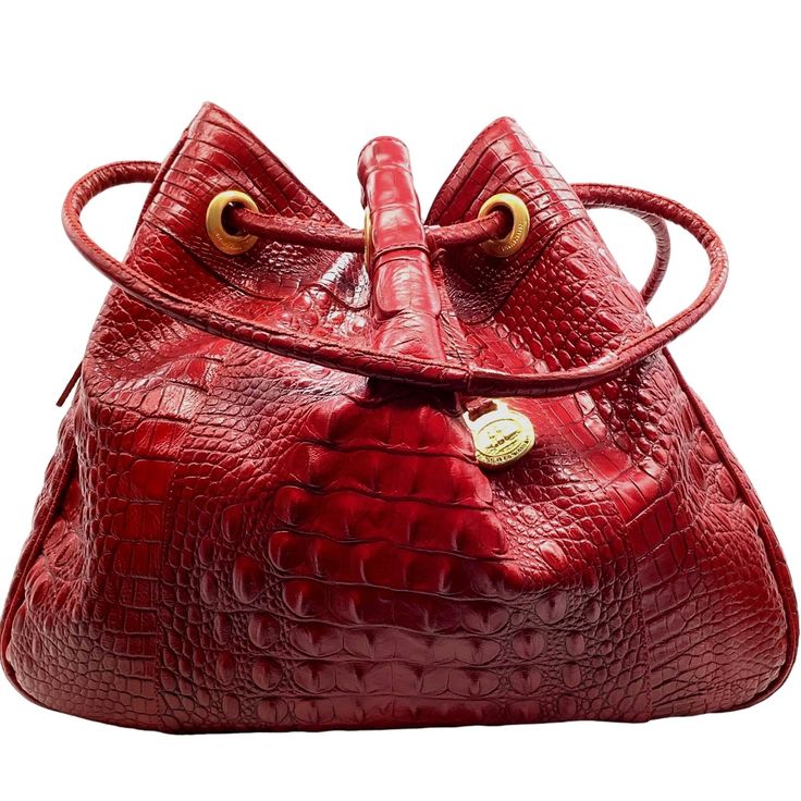 BRAHMIN "Dana" Melbourne Drawstring CInch Top Shoulder Bag A retired style in a hard to find deep "Vintage Red" color, this is a roomy tote. The slouchy style has a drawstring with double handle, making it easy to throw over your shoulder and be on the go every day. Style: DANA COLOR: Vintage Red Drawstring closure  Bucket cinch top style Modern oversized gold tone branded eyelet detail Double handles Gold tone hardware One exterior zip side pocket Two interior zip pockets Two organizer pockets Keyclip  Pen loops Approx 16" x 13"x 4" Strap drop approx 11" Features: * drawstring, croc embossed, leather, Brahmin Dana, Size: Womens OS Condition: Pre-Owned Good Shoulder Bags, Zug, Drawstring Shoulder Bag, Slouchy Style, Color Vintage, Side Pocket, Purses And Handbags, Red Color, Red Leather