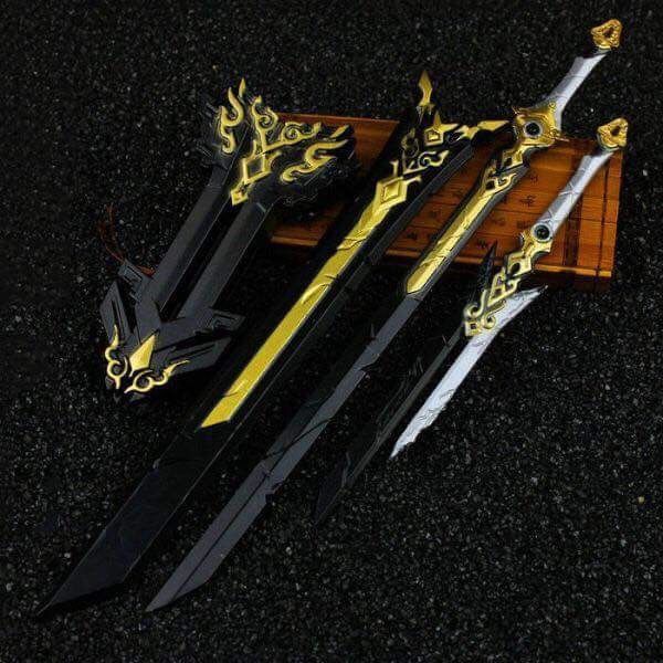 three different types of swords are laying on top of each other, with gold accents