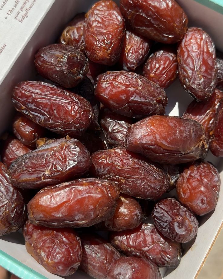 a box filled with raisins sitting on top of a table