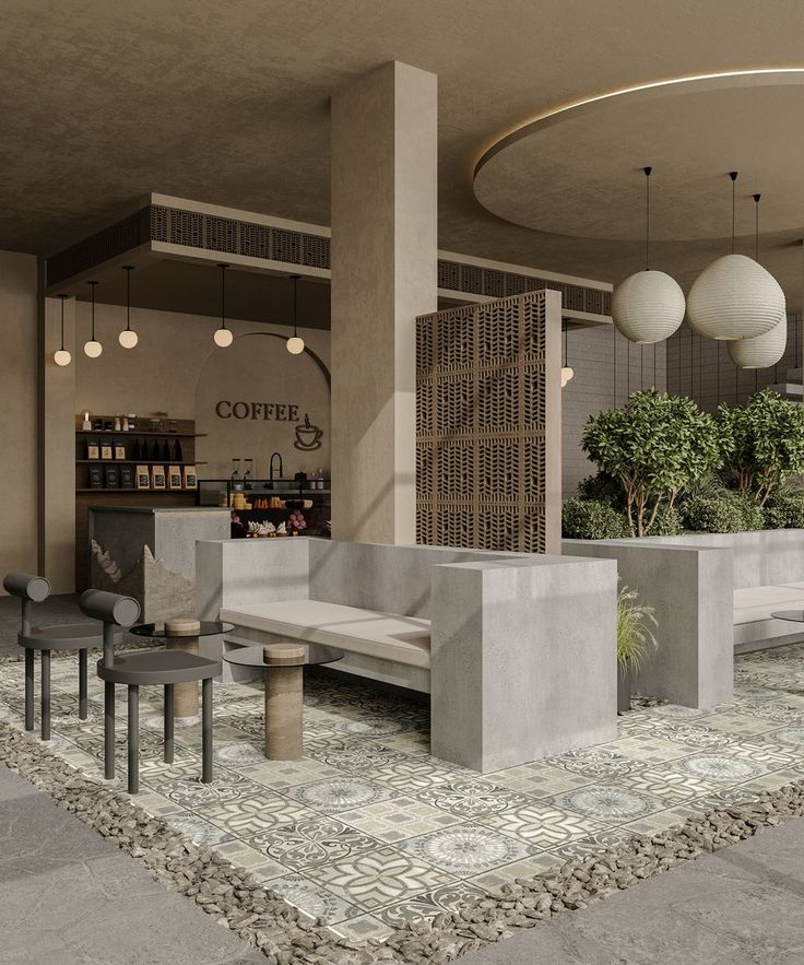 the interior of a coffee shop with tables, chairs and potted plants on display