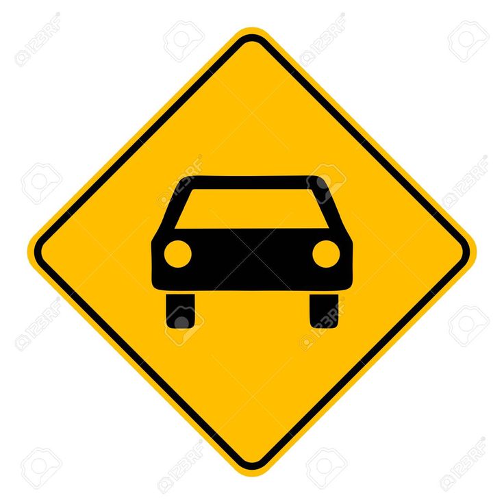 a yellow and black traffic sign with a car on it's side stock photo